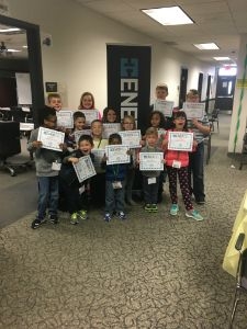 Employees Children and Family Friends learn about Batteries and the Science behind them